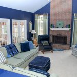 Family room with brick fireplace by NJ and Philadelphia interior design firm Distinctive Interior Designs