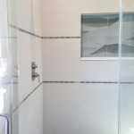 Master Shower Wave and Pebble tile | Cranbury NJ | Distinctive Interior Designs