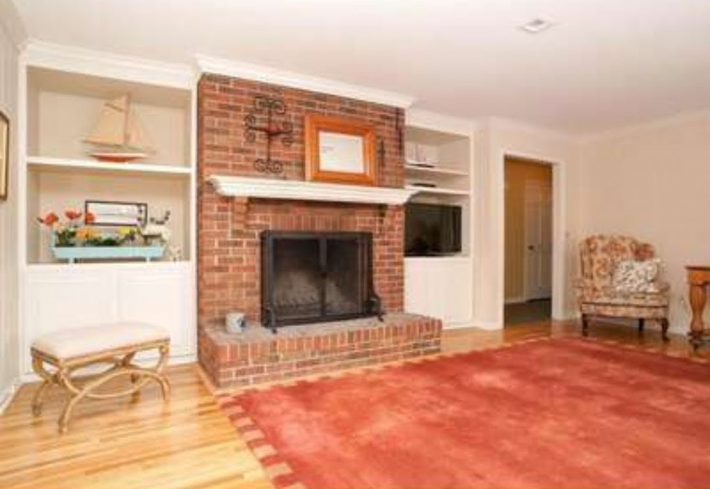 Family room fireplace before photo NJ interior designer Distinctive Interior Designs