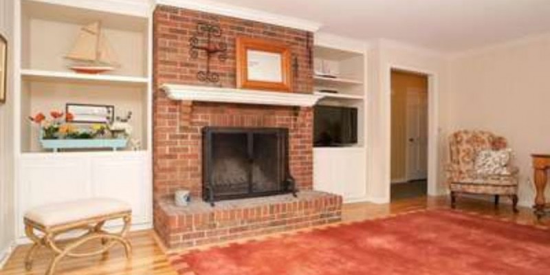 Family room fireplace before photo NJ interior designer Distinctive Interior Designs