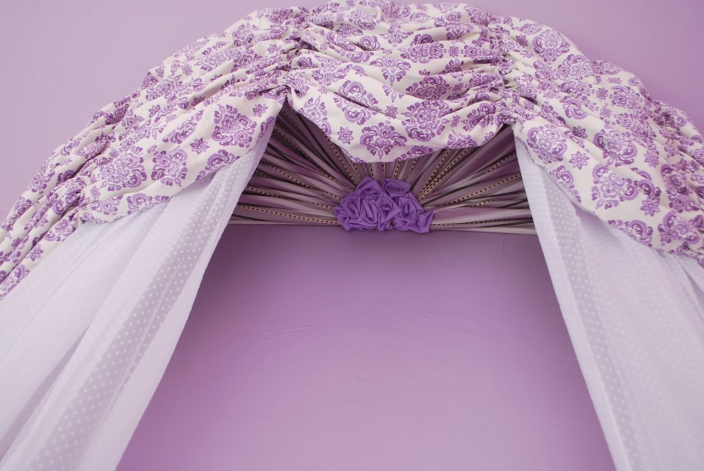 Details under baby crib canopy treatment