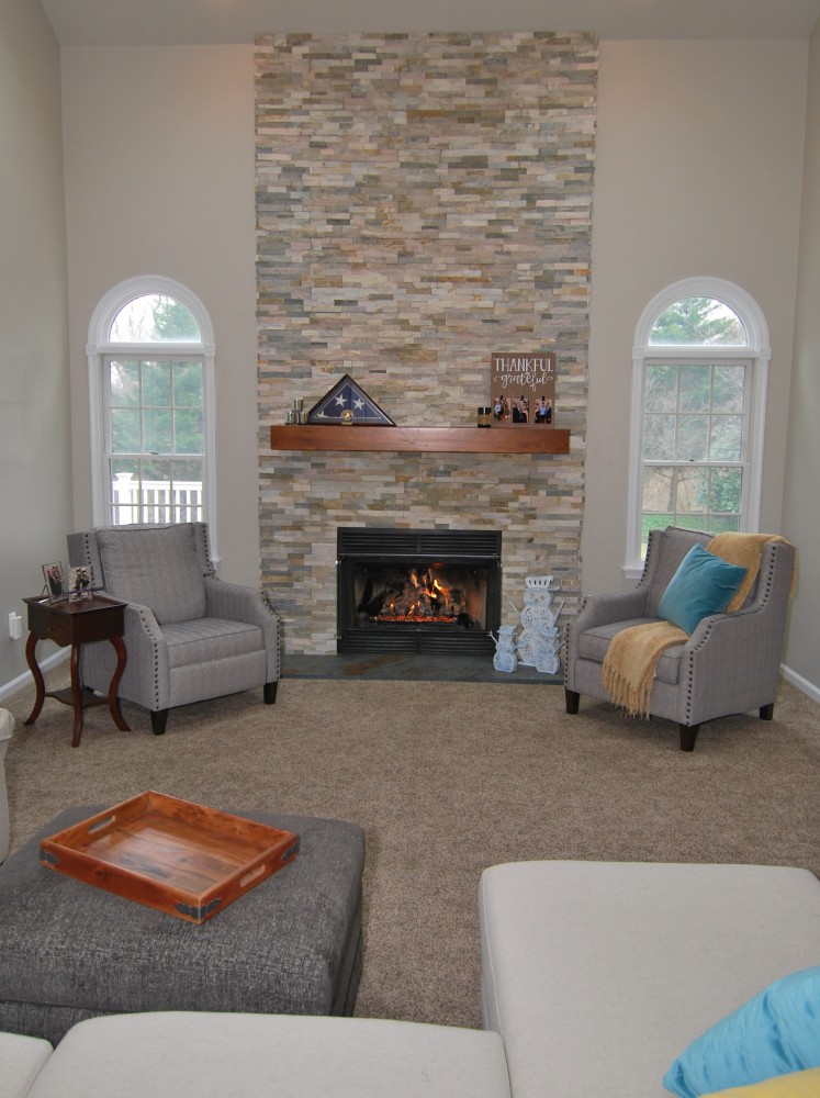 Benjamin Moore Revere Pewter Paint with stacked stone fireplace