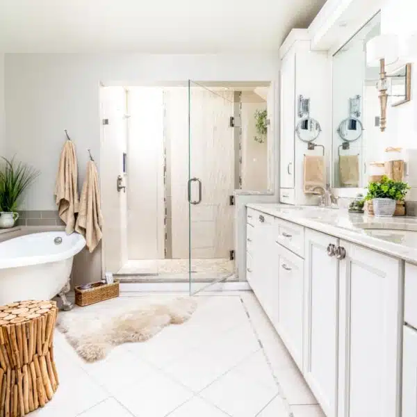 Double Vanity Spa Bath with wave and pebble tile accenting after renovation, Marlton, New Jersey