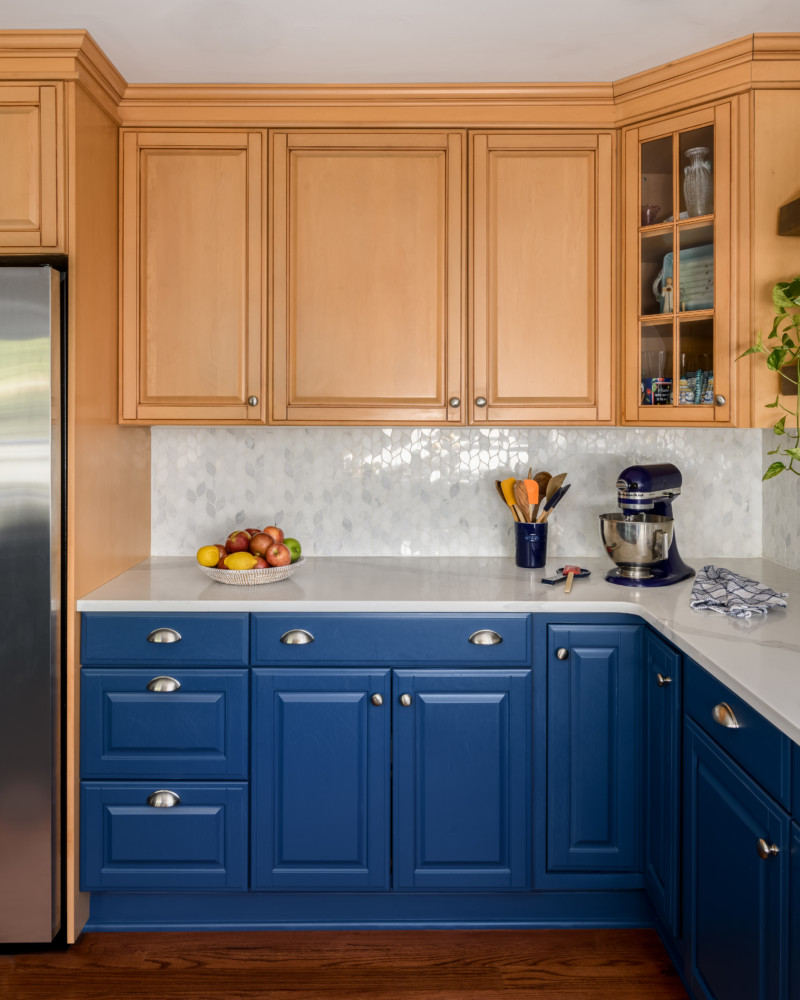Colonial Blue and Midtone wood cabinet kitchen
