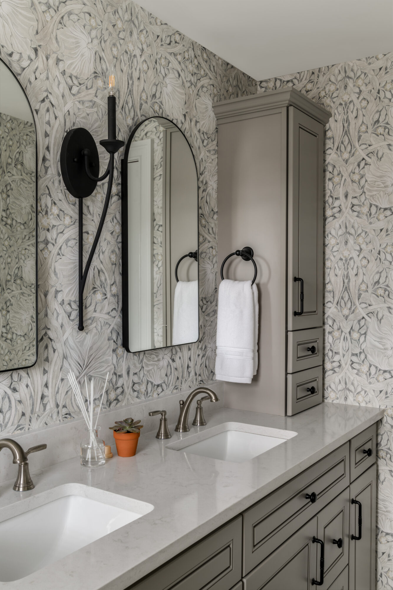 Marlton, New Jersey, bathroom counter tower renovation with gray cabinets, floral wallpaper, and matte black