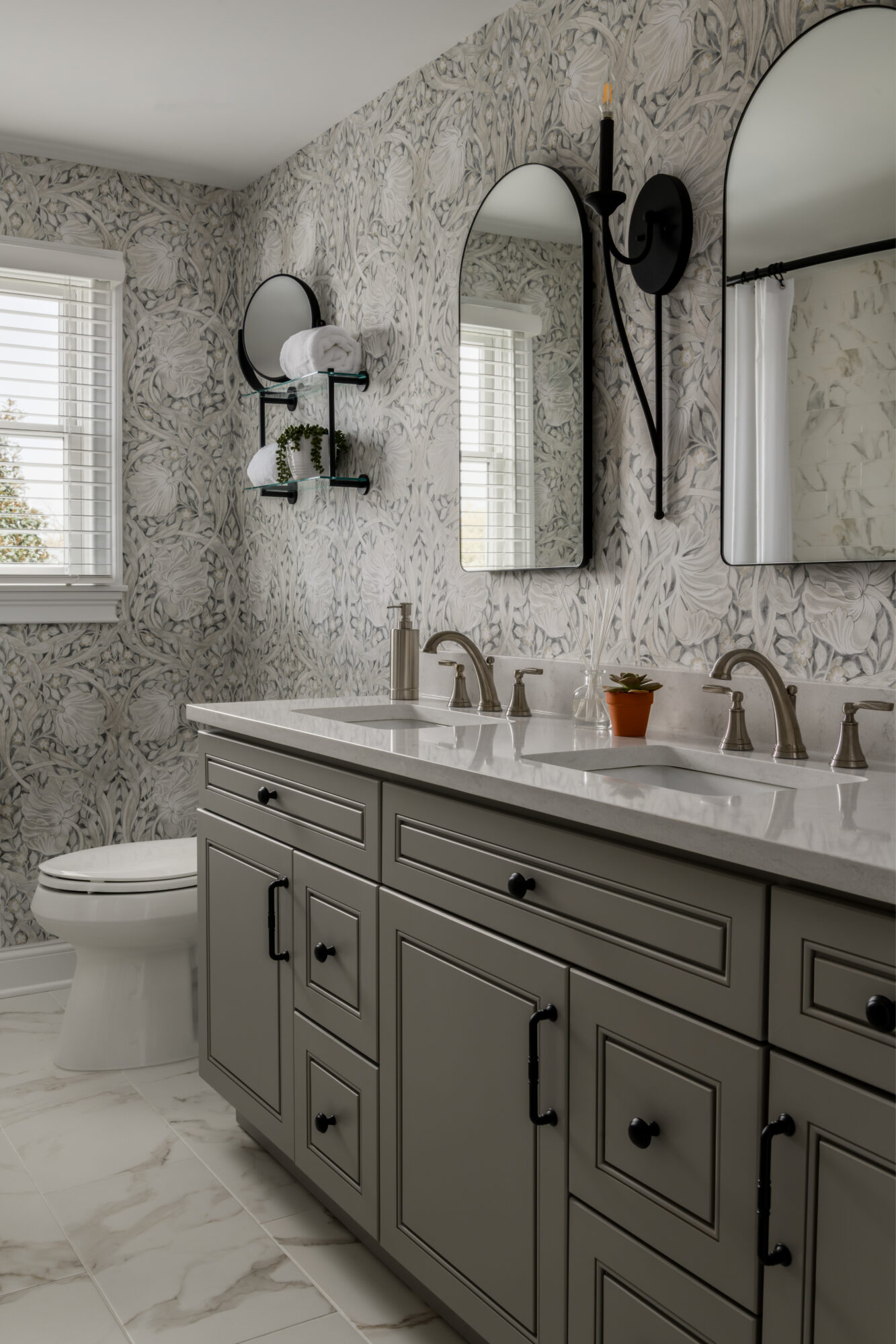 Marlton, New Jersey, hall bathroom renovation design with gray cabinets, floral wallpaper, and matte black